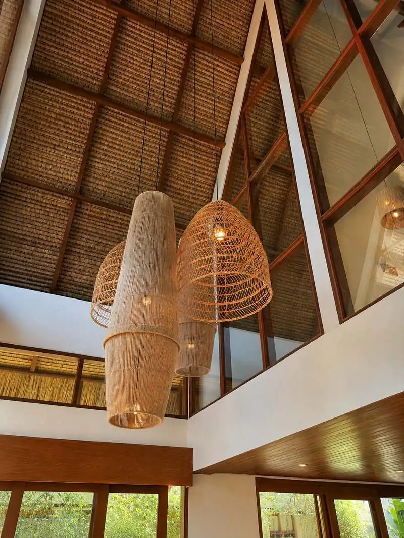 Rattan pendants under the A-frame ceiling