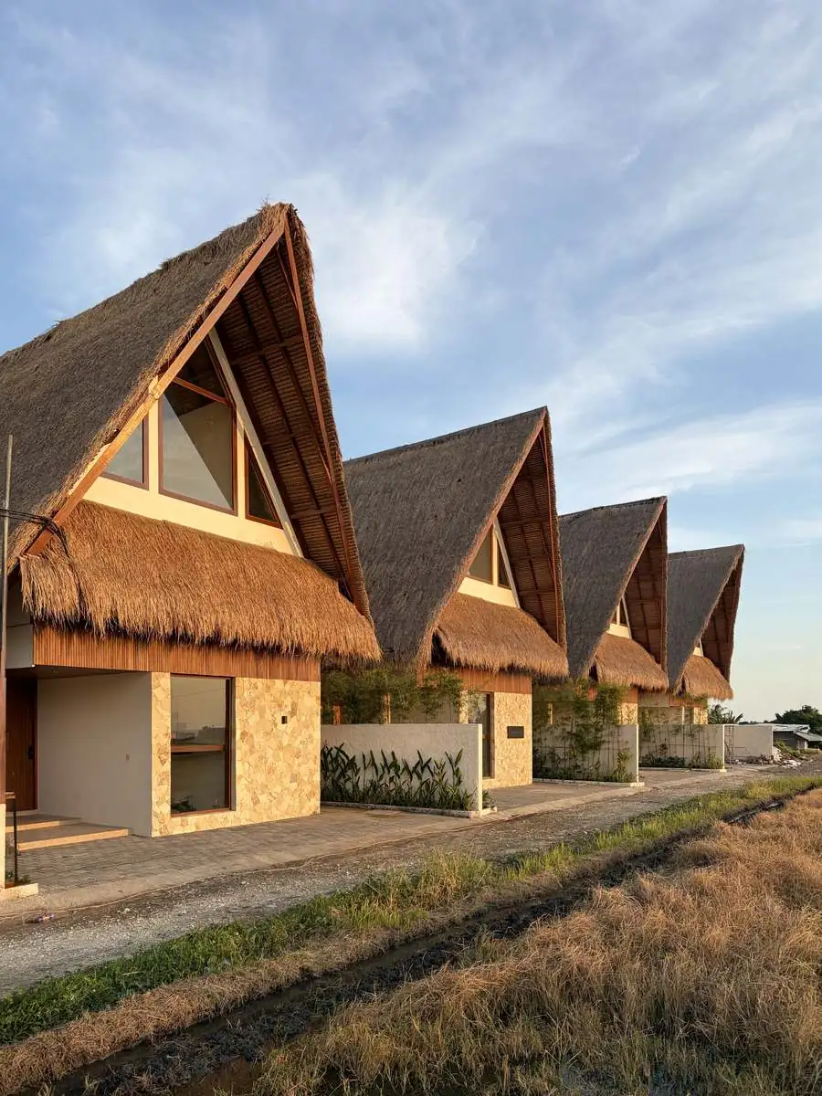 Luxury Huts — the finished A-frame villas in Kedungu, photographed on site