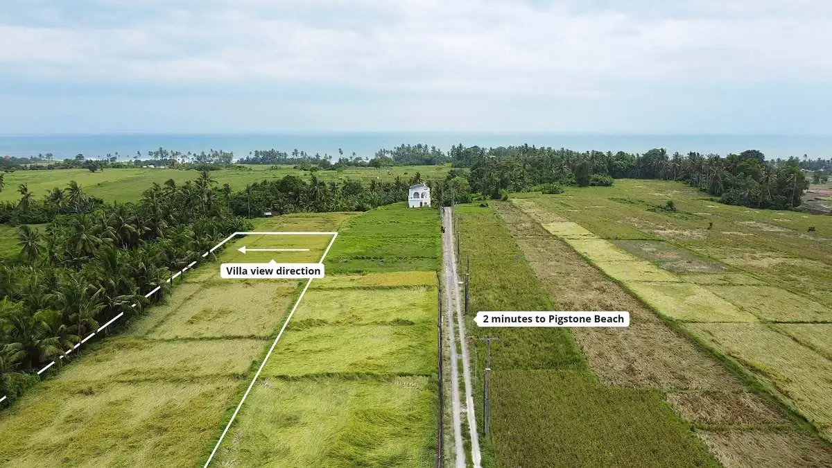 Drone photo of the Moroccan Cubes plot — villa view direction, 2 minutes to Pigstone Beach